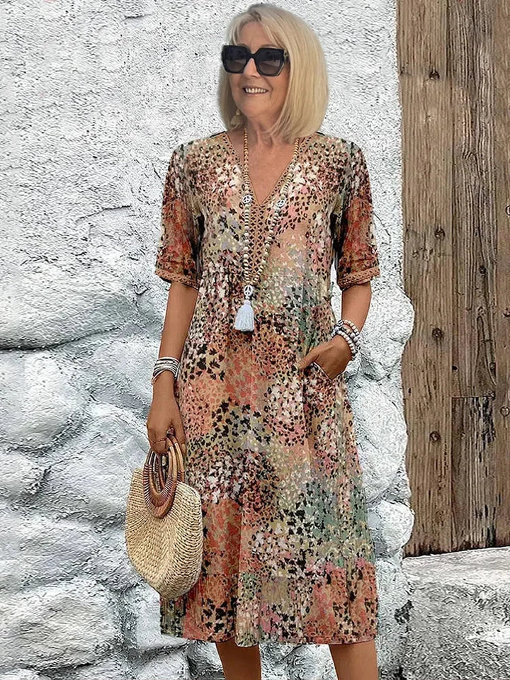 Rosélia – Robe midi éclatante
