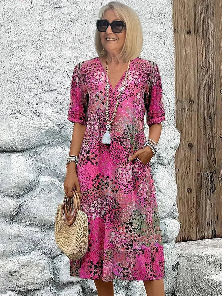 Rosélia – Robe midi éclatante