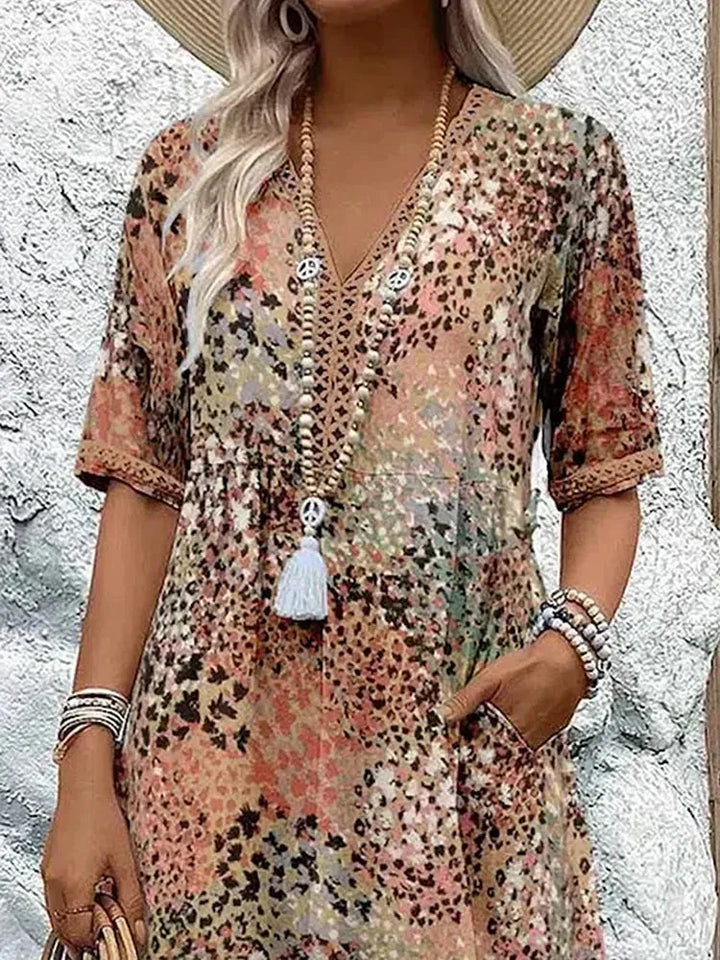 Rosélia – Robe midi éclatante