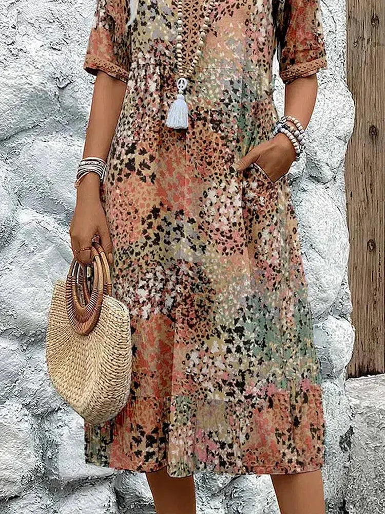 Rosélia – Robe midi éclatante