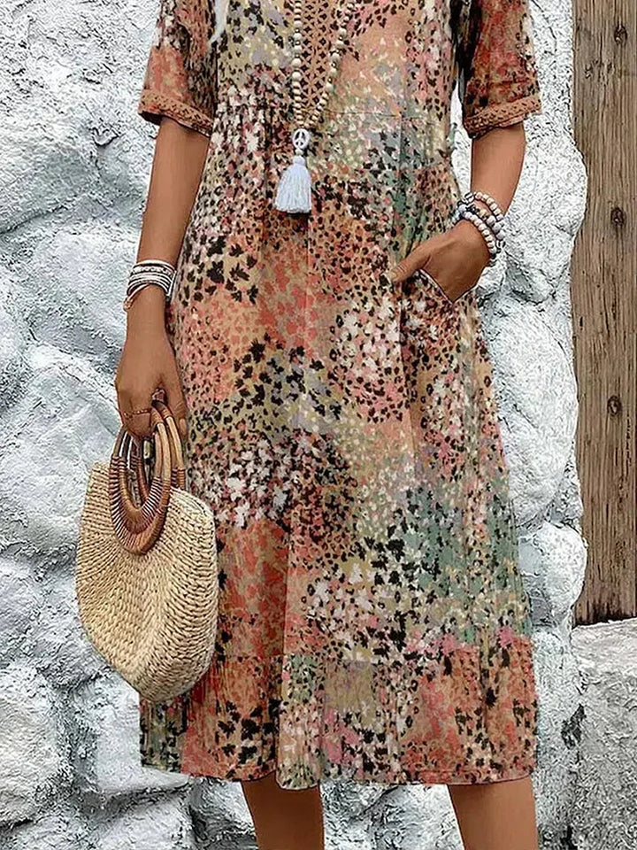 Rosélia – Robe midi éclatante