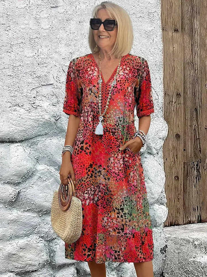 Rosélia – Robe midi éclatante