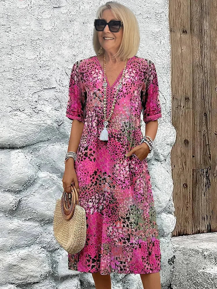 Rosélia – Robe midi éclatante