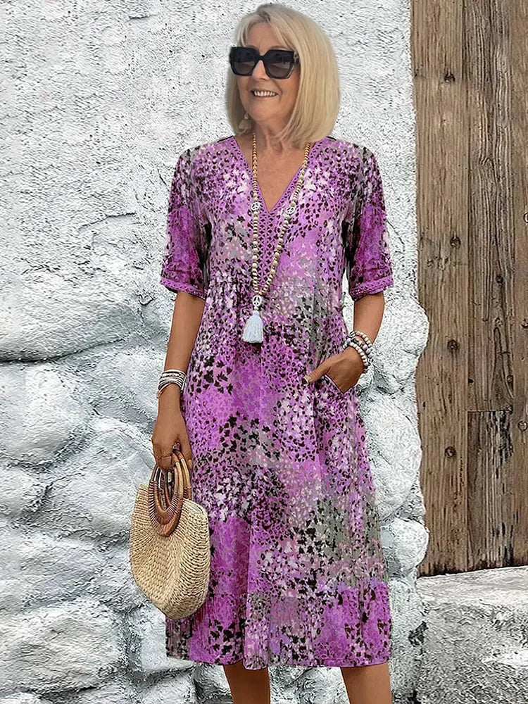 Rosélia – Robe midi éclatante