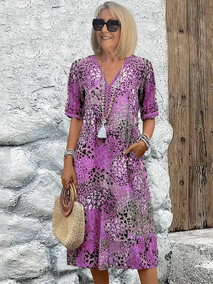 Rosélia – Robe midi éclatante